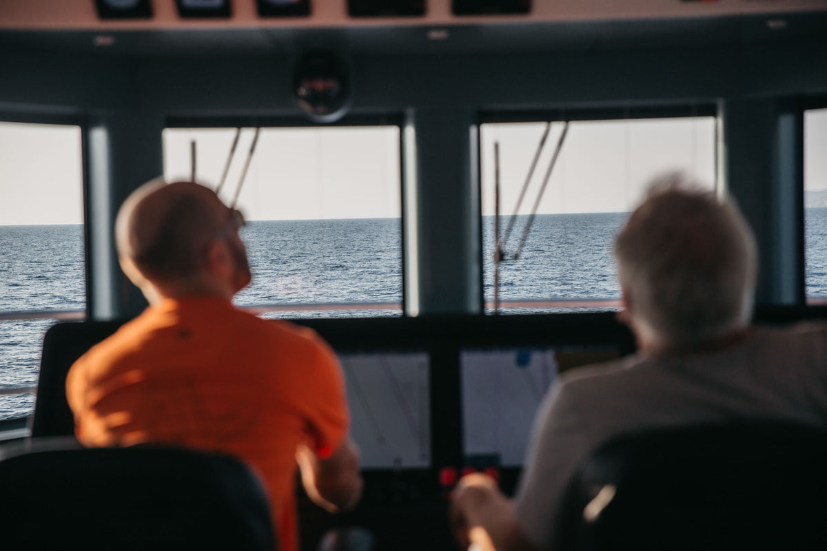 Arksen fractional yacht ownership showing an Arksen 85 sailing with two people at the helm
